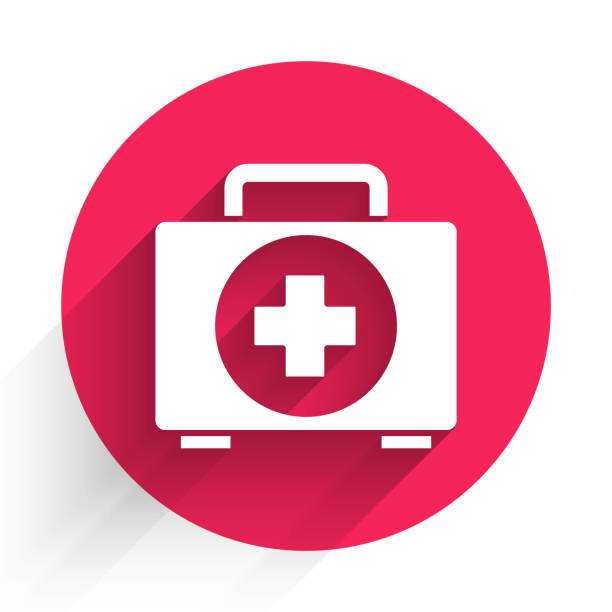 istockphoto-1254191034-612x612 White First aid kit icon isolated with long shadow. Medical box with cross. Medical equipment for emergency. Healthcare concept. Red circle button. Vector Illustration